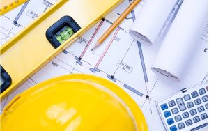 Helmet and project drawing on the table