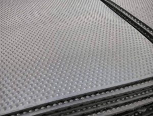 Black rubber mat for livestock building