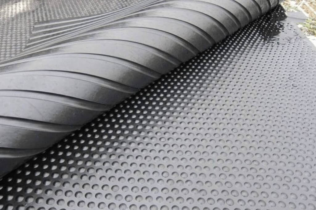 Folded black rubber mat
